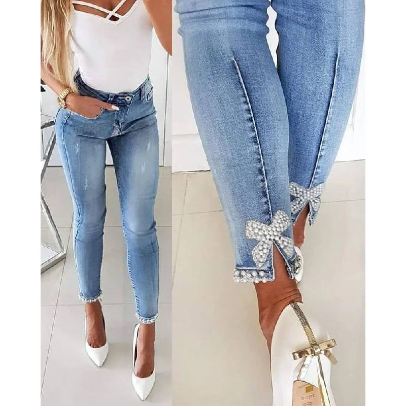 Temperament Slim Butterfly Beaded Foot Opening Jeans Wholesale Womens Clothing